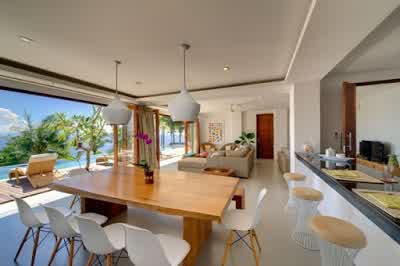Dining and Kitchen Design in Malimbu Cliff Villa in Lombok Island Indonesia 700x465 Desain Rumah Mewah Terletak di Nusa Tenggara Barat Indonesia